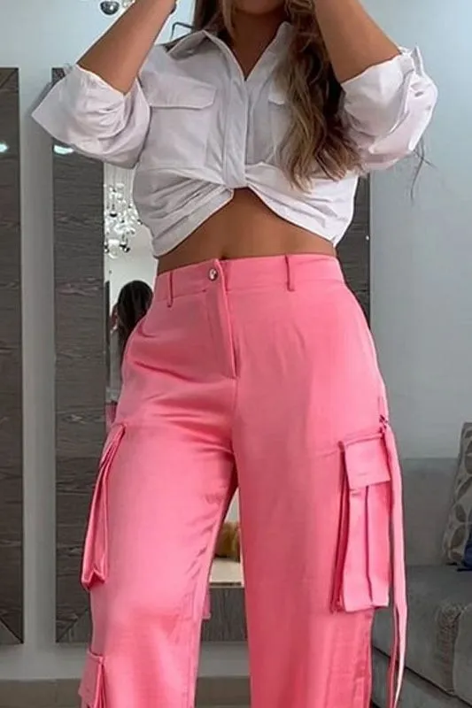 Pink parachute pants and white short shirt